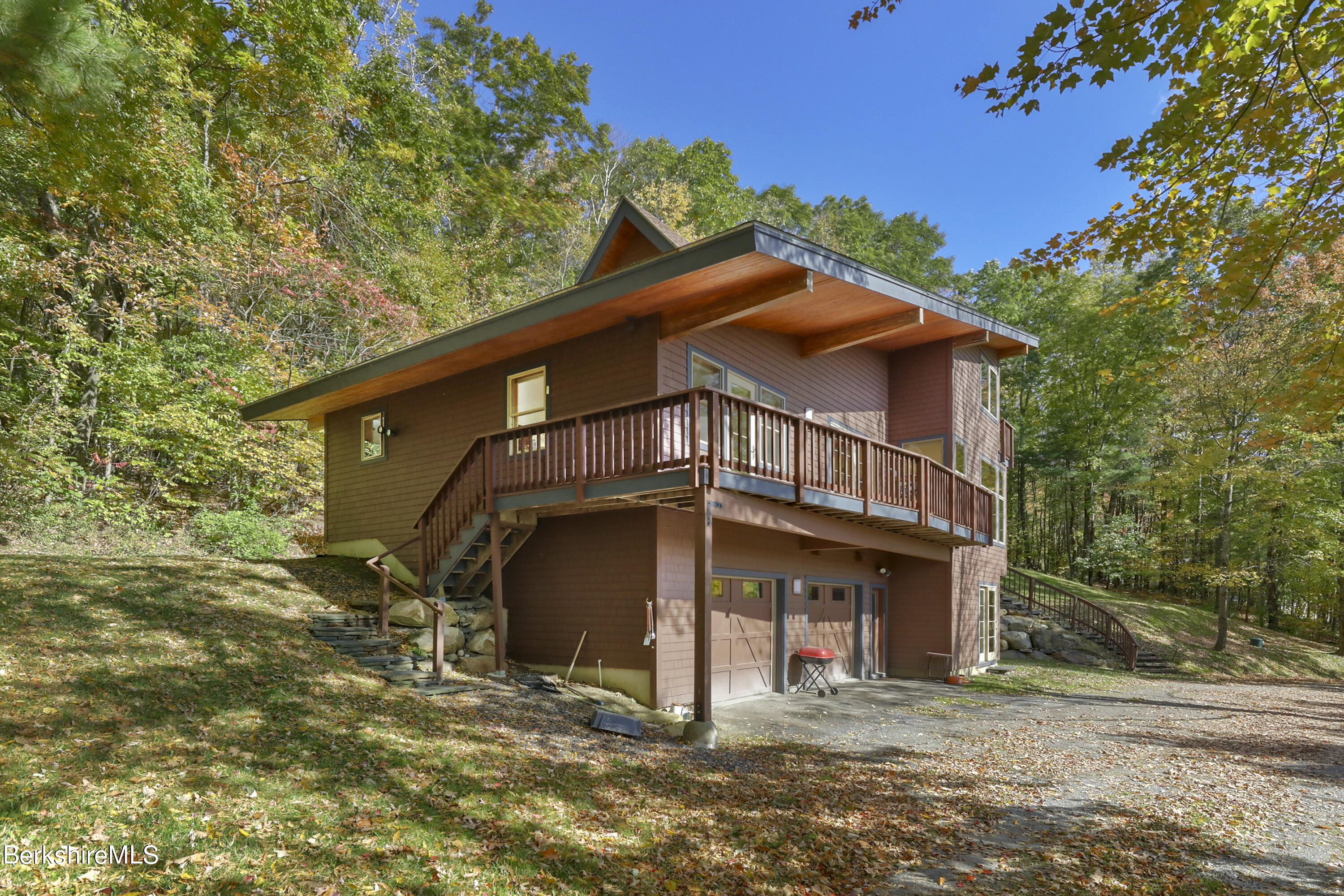 494 Dean Hill Road Richmond, MA 01254 - Photo 44 of 54 a view of a house with a yard