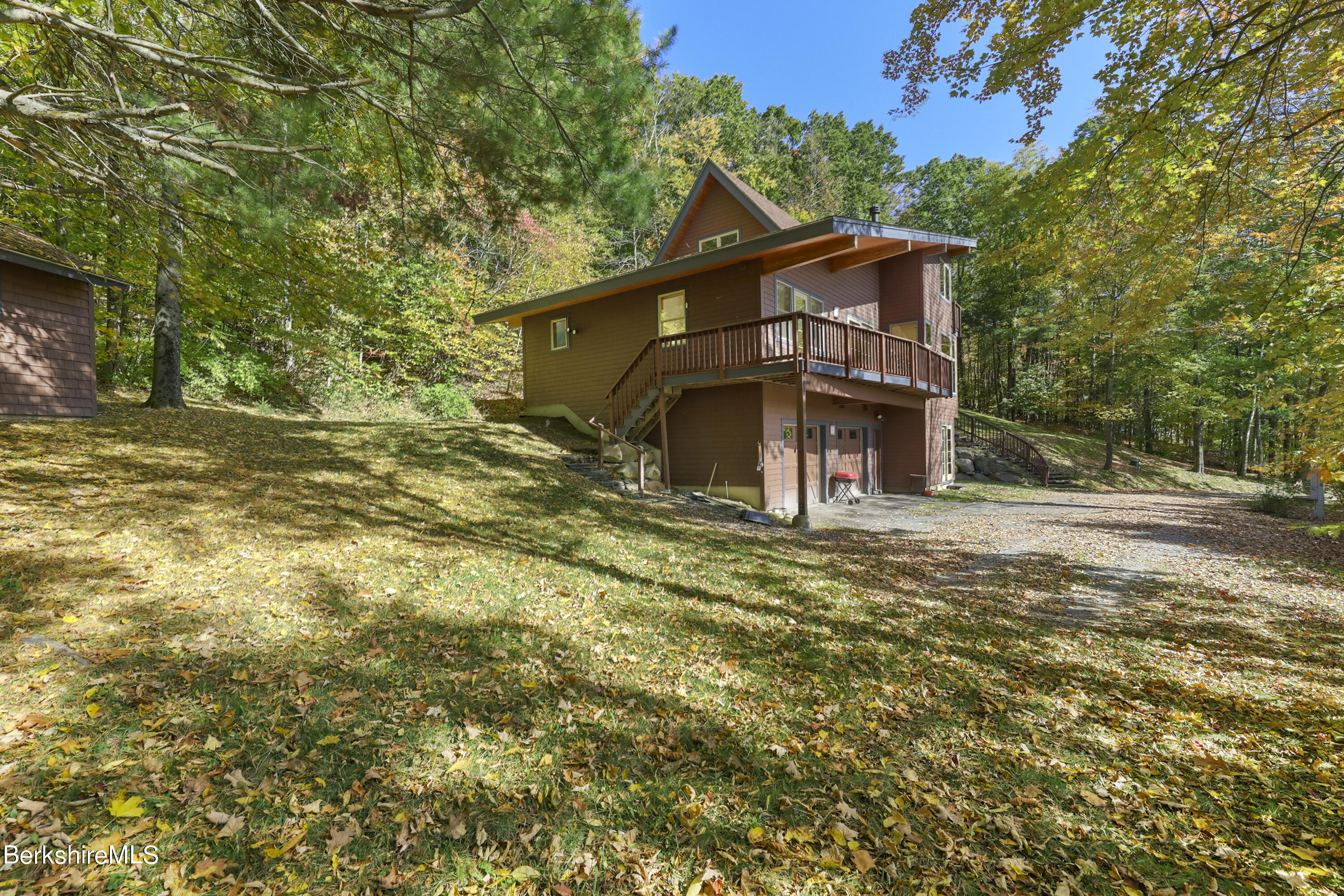 494 Dean Hill Road Richmond, MA 01254 - Photo 45 of 54 a view of a house with a yard