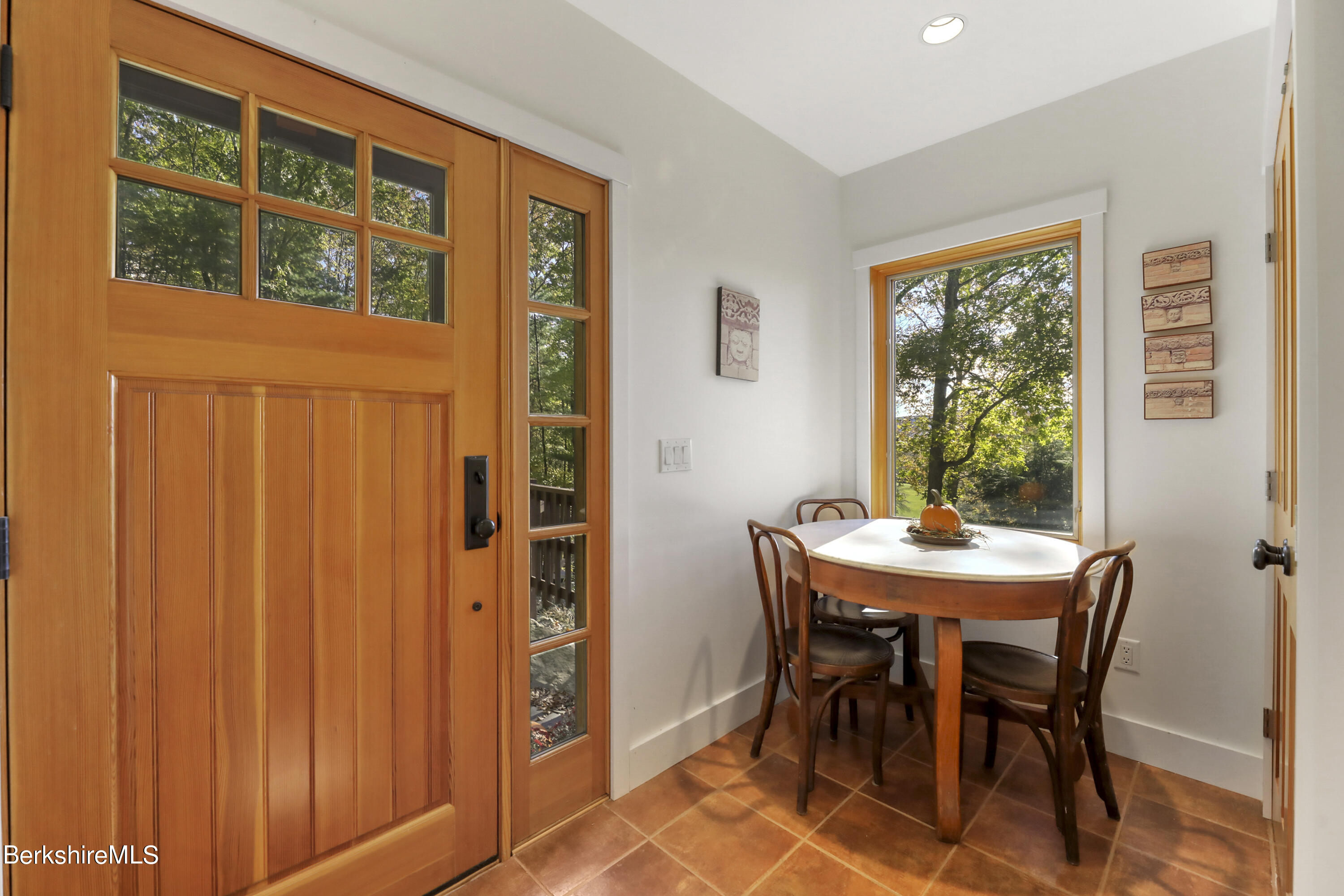 494 Dean Hill Road Richmond, MA 01254 - Photo 7 of 54 a view of a dining room with furniture and window