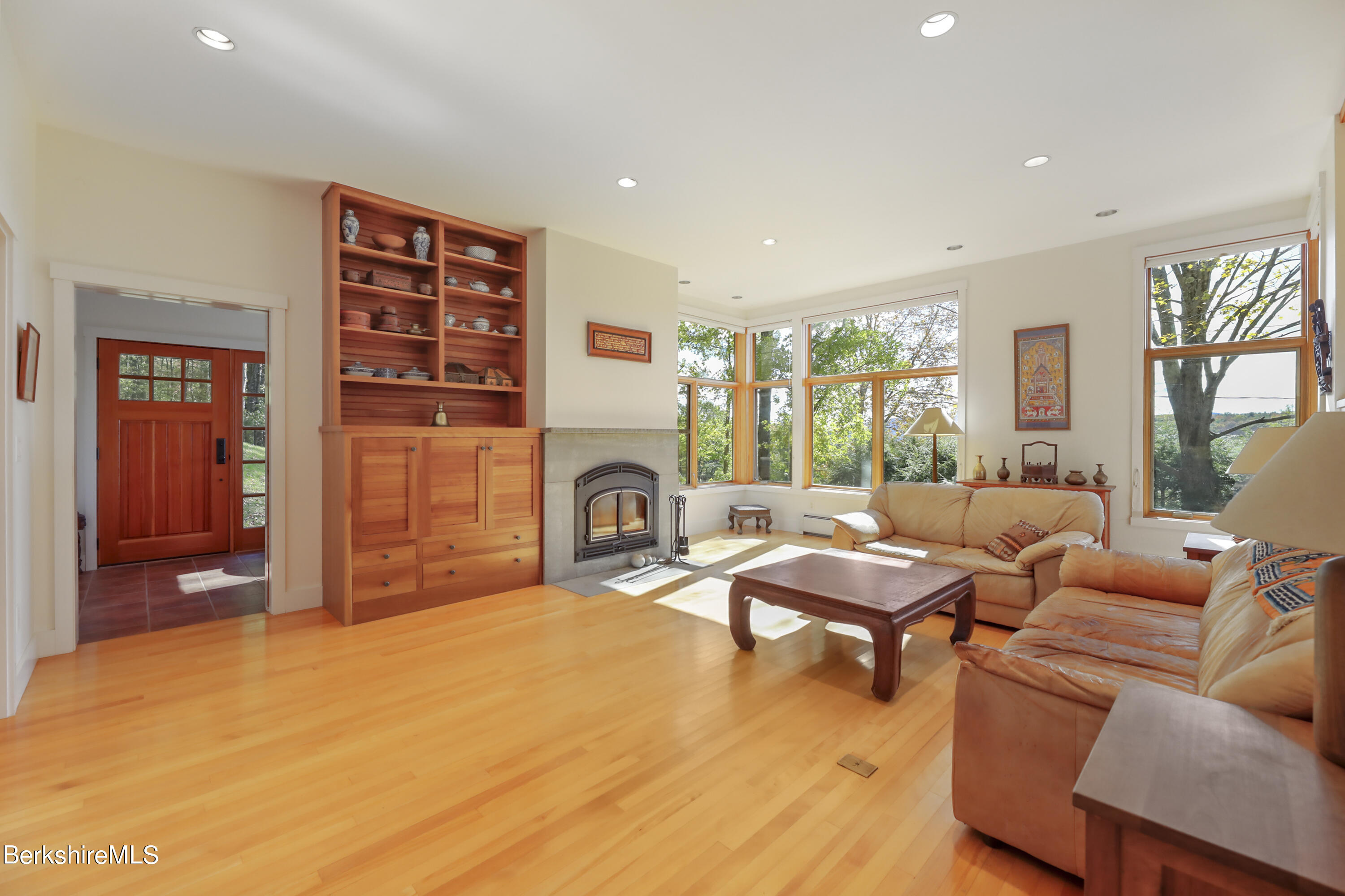 494 Dean Hill Road Richmond, MA 01254 - Photo 10 of 54 a living room with furniture and a fireplace