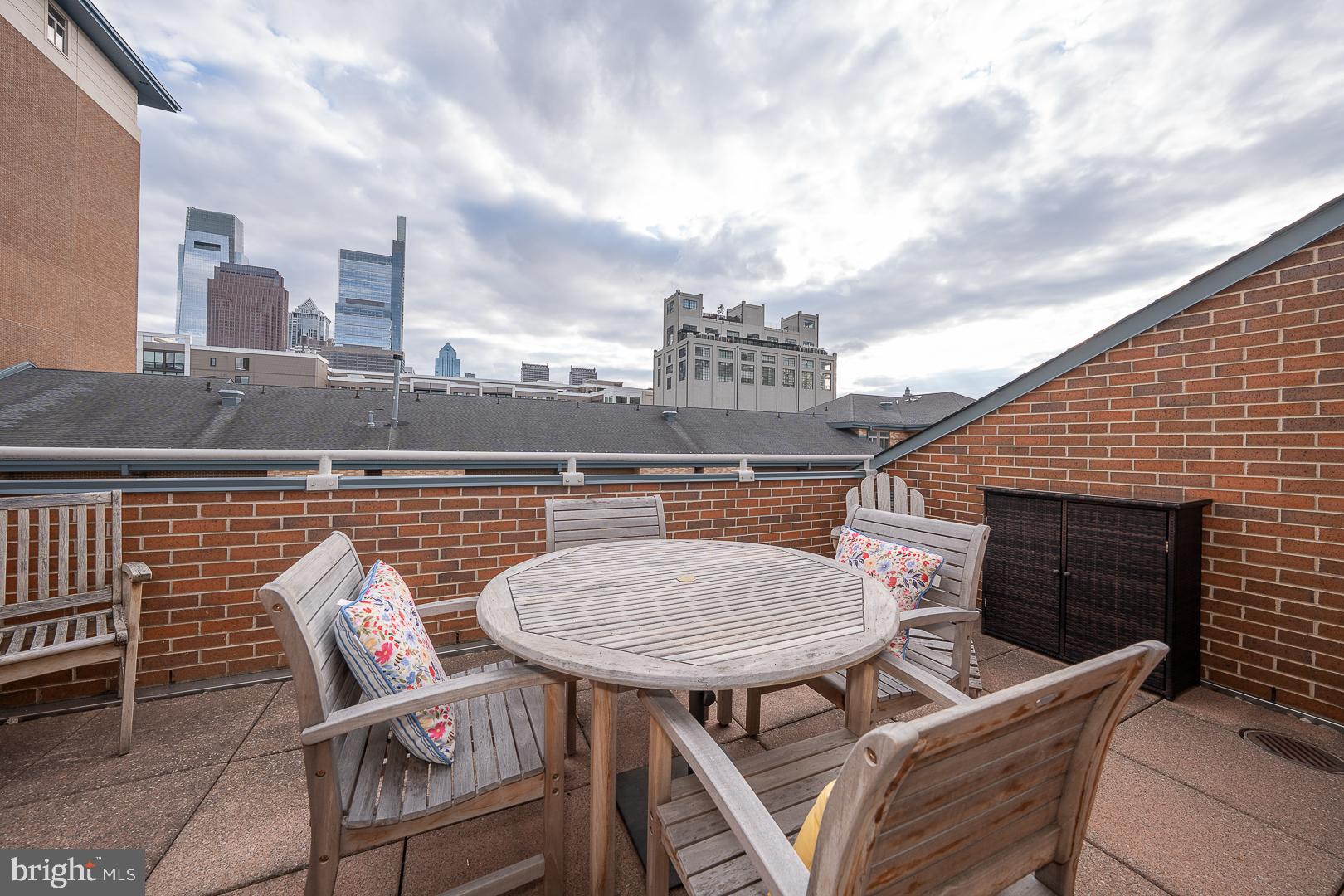 1900 Hamilton Street, Unit D19 Philadelphia, PA 19130 - Photo 13 of 41 a terrace of a house with outdoor seating