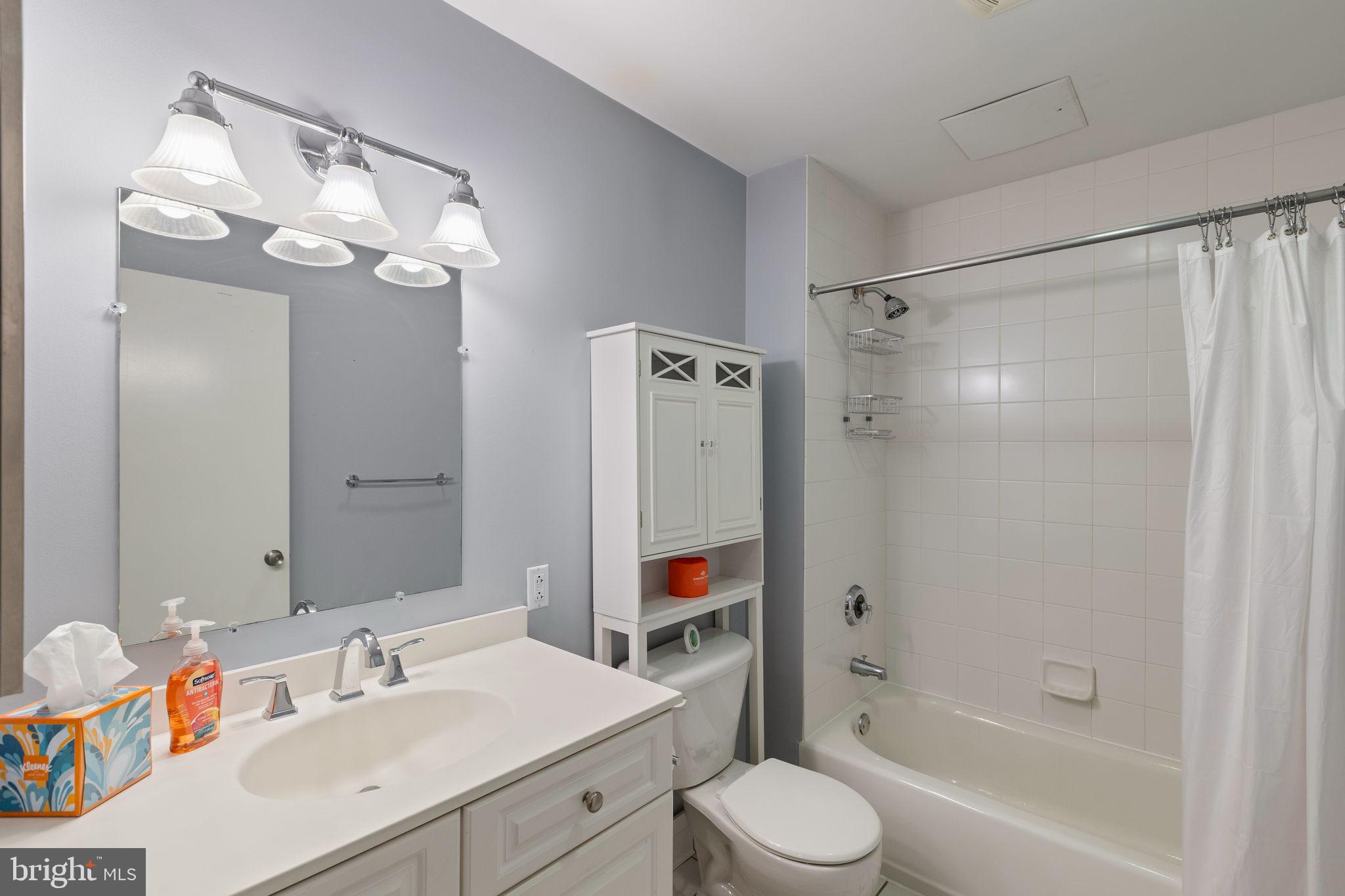 1900 Hamilton Street, Unit D19 Philadelphia, PA 19130 - Photo 24 of 41 a bathroom with a sink a toilet and shower
