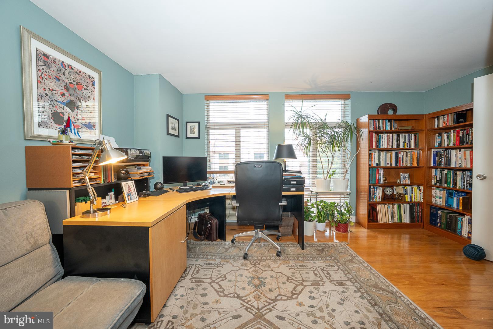 1900 Hamilton Street, Unit D19 Philadelphia, PA 19130 - Photo 26 of 41 a room with furniture a rug and a window