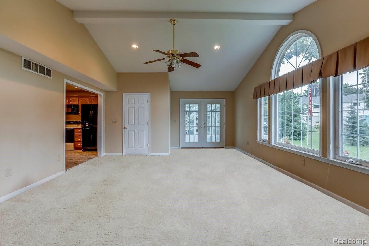 641 Reed Court Northville, MI 48167 - Photo 15 of 32 FAMILY ROOM WITH NEW CARPET