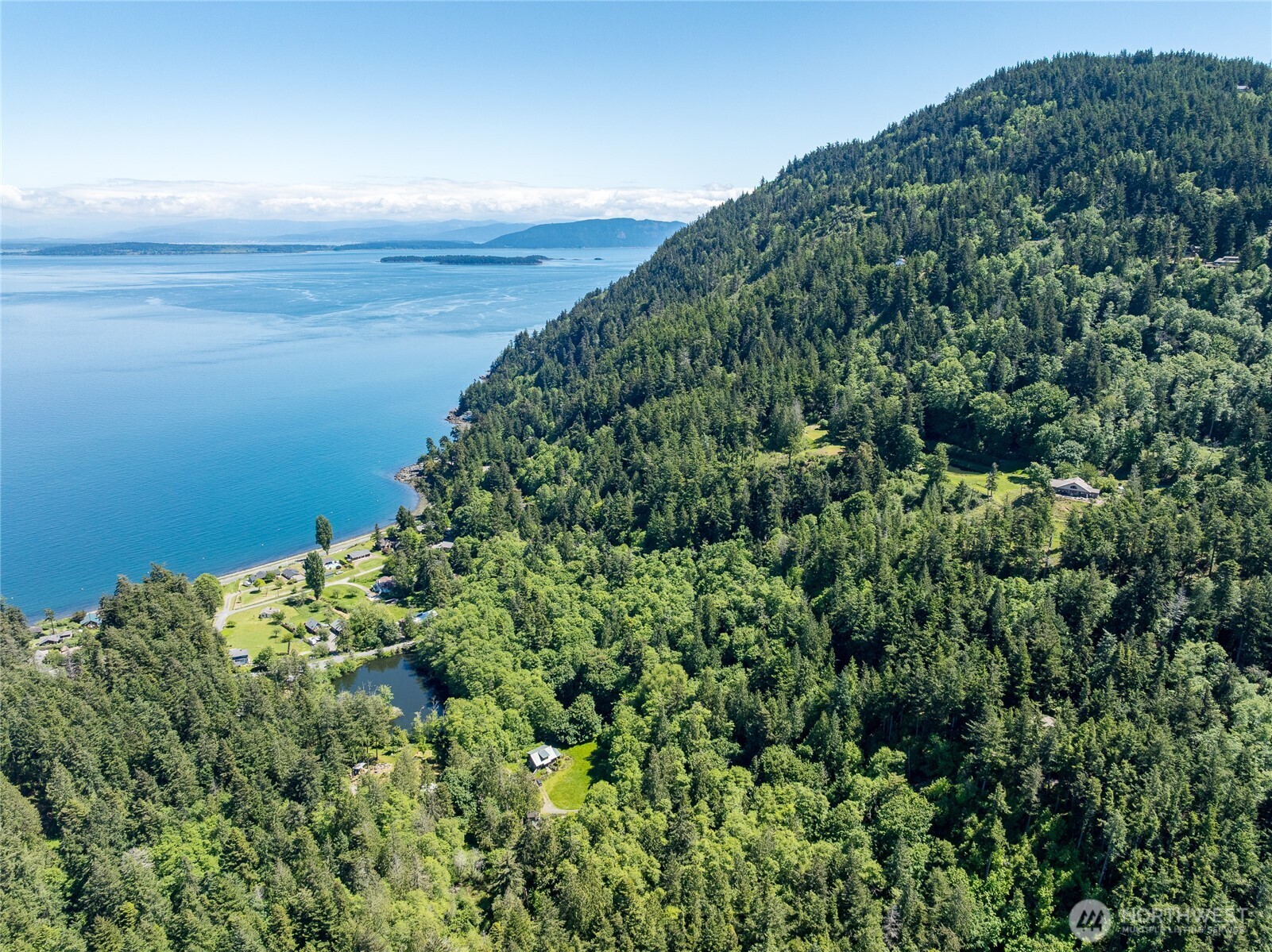 463 Wright Road Orcas Island, WA 98245 - Photo 40 of 40 a view of a green field with lots of bushes