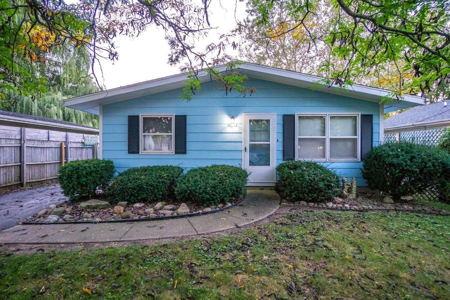 704-1 Juniper Road Valparaiso, IN 46385 - Photo 2 of 10 a front view of a house with garden