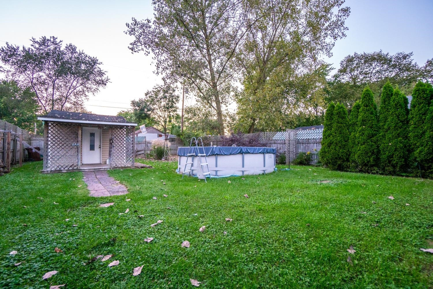 704-1 Juniper Road Valparaiso, IN 46385 - Photo 3 of 10 a view of a backyard with garden and entertaining space