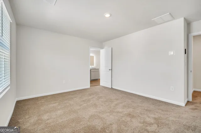 an empty room with an entryway