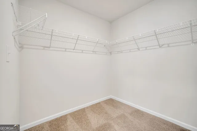 a view of a room with racks on the wall