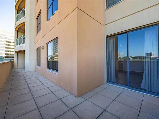 a bedroom with a bed and a walk in closet