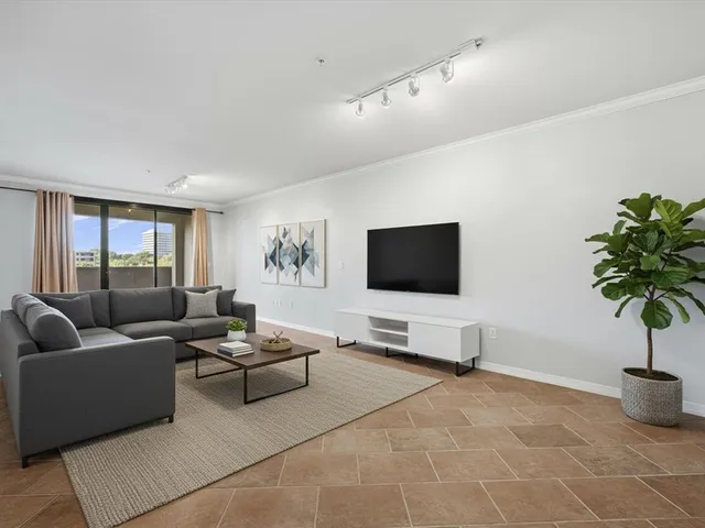 a kitchen that has a sink and cabinets