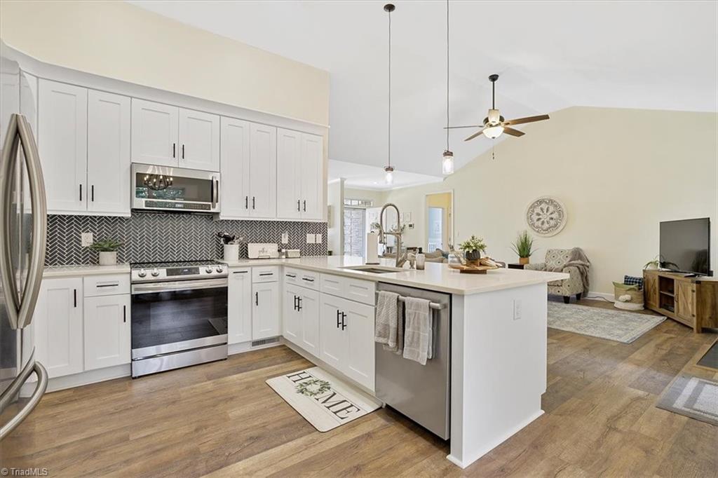 7521 Kristen Drive Oak Ridge, NC 27310 - Photo 12 of 34 Cook and Entertain at the same time!
