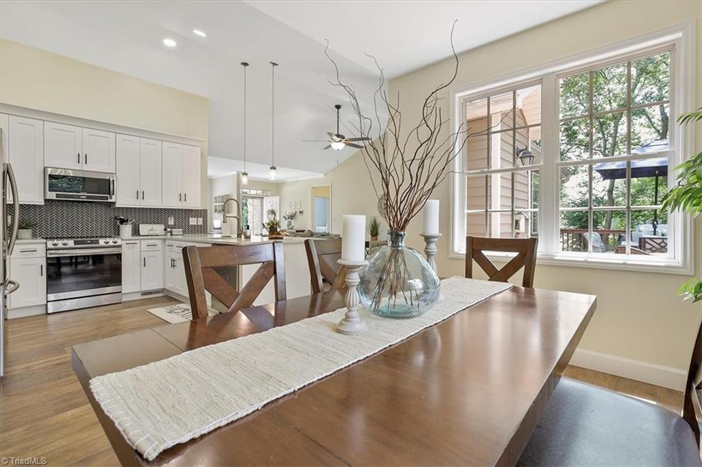 7521 Kristen Drive Oak Ridge, NC 27310 - Photo 13 of 34 Large breakfast room is being used as the Formal Dining space