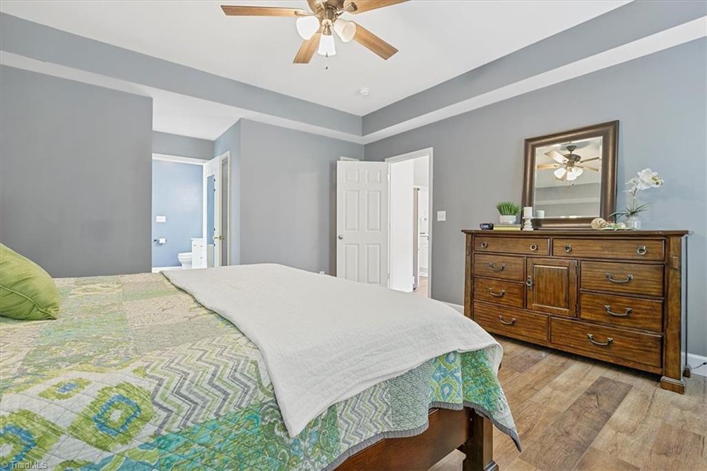 7521 Kristen Drive Oak Ridge, NC 27310 - Photo 19 of 34 Spacious Primary bedroom
