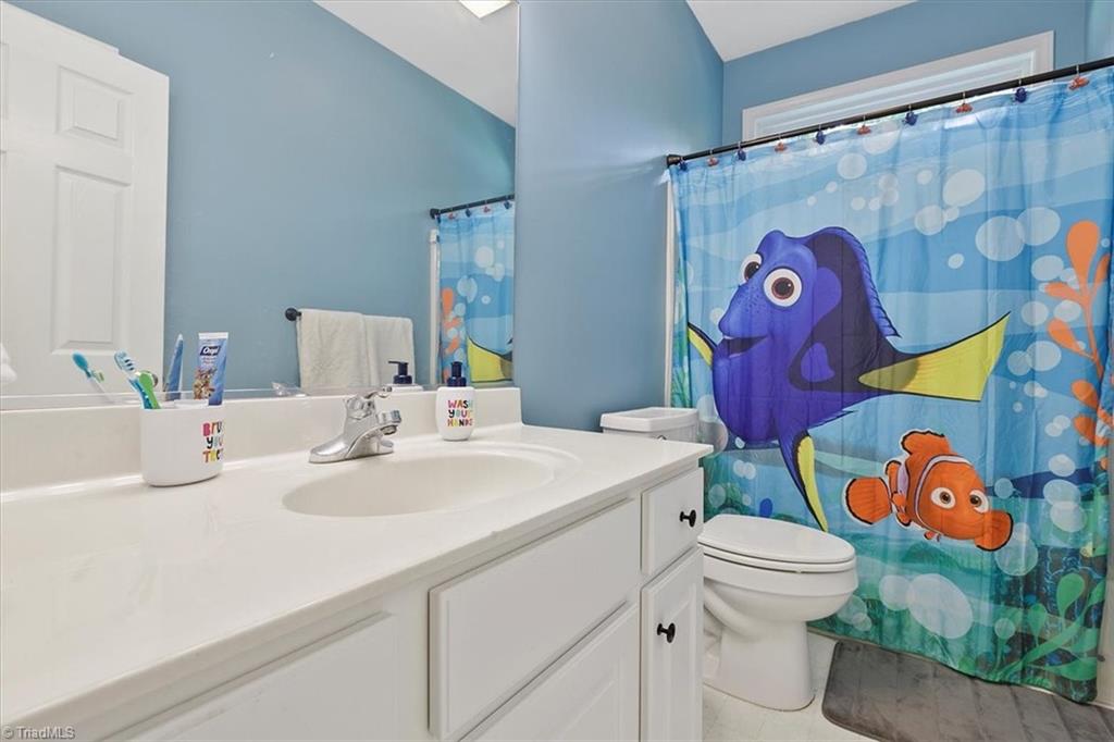 7521 Kristen Drive Oak Ridge, NC 27310 - Photo 24 of 34 Hall full Bath