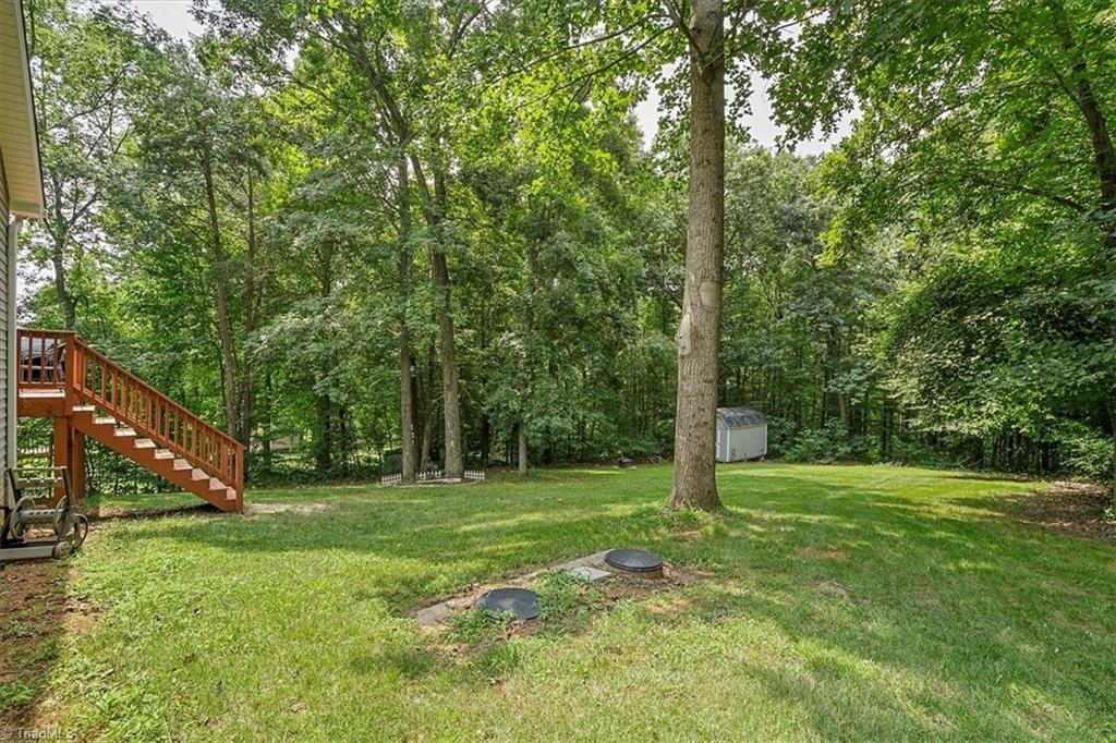 7521 Kristen Drive Oak Ridge, NC 27310 - Photo 29 of 34 Lovely private backyard setting