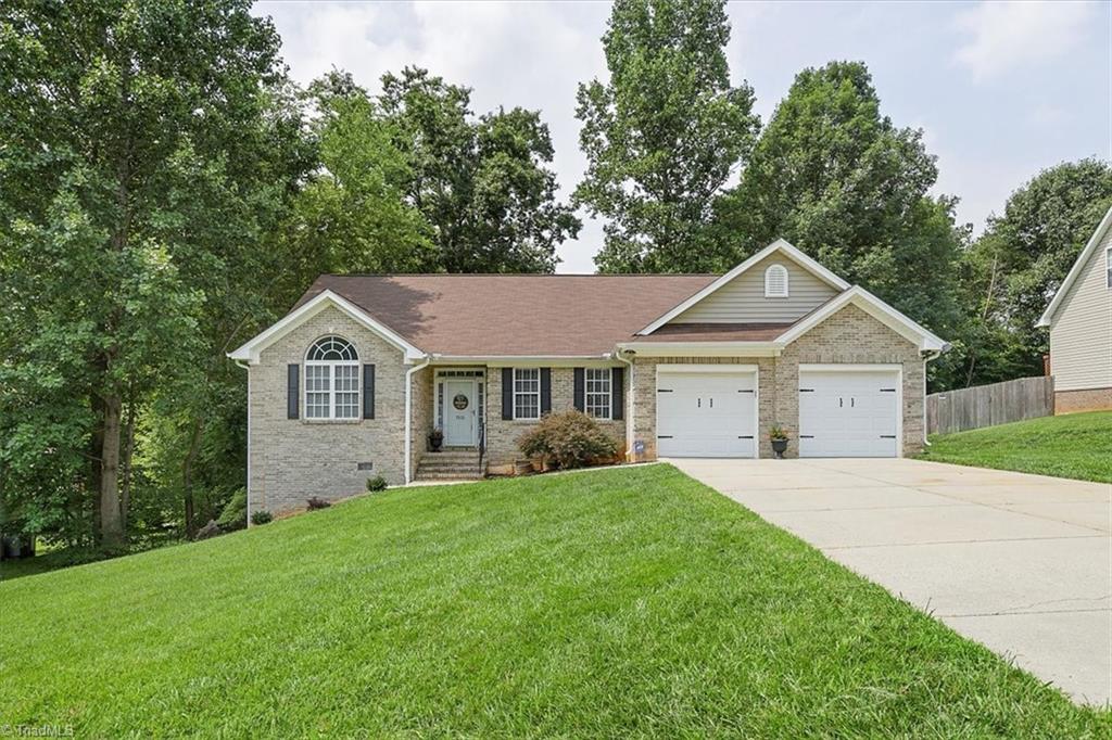 7521 Kristen Drive Oak Ridge, NC 27310 - Photo 4 of 34 TONS of parking space for family and friends!