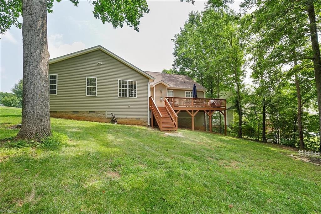 7521 Kristen Drive Oak Ridge, NC 27310 - Photo 31 of 34 Lovely spacious backyard