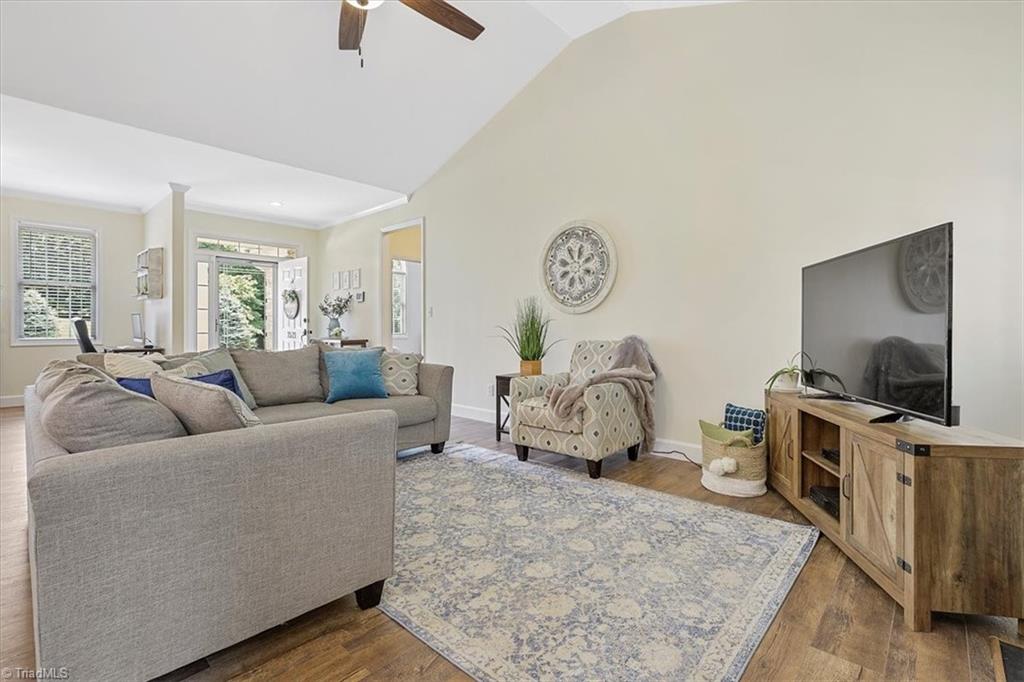 7521 Kristen Drive Oak Ridge, NC 27310 - Photo 7 of 34 Soaring vaulted ceilings in the living space