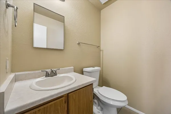 a bathroom with a sink and a toilet