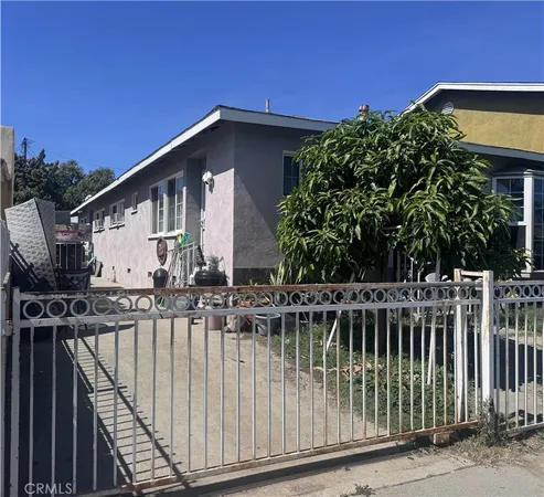 a house view with a garden space
