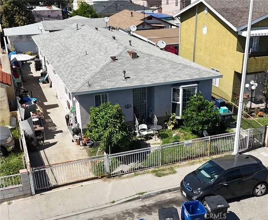 an outdoor view of house with seating space