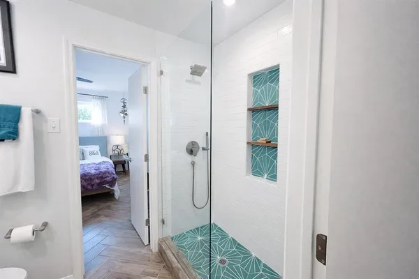 a view of a bedroom from balcony