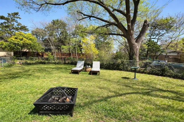 a view of a garden with a slide