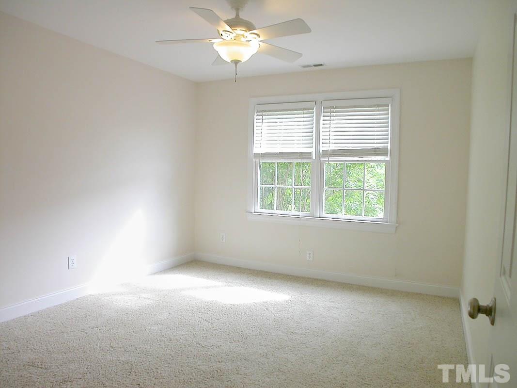 5409 Levering Mill Road Apex, NC 27539 - Photo 14 of 22 an empty room with a window