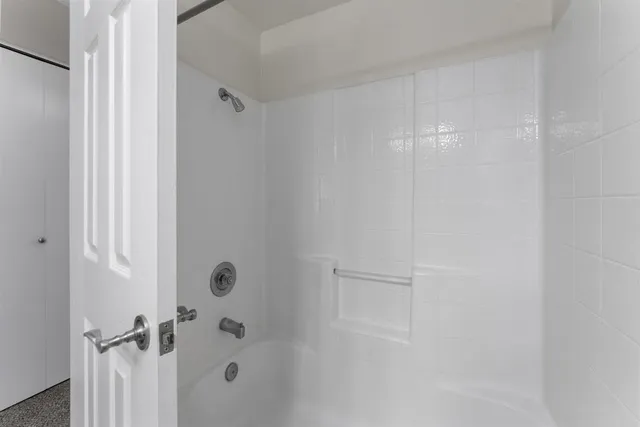 a view of empty room with windows