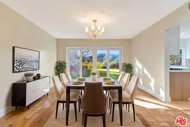 a kitchen with a stove and a sink