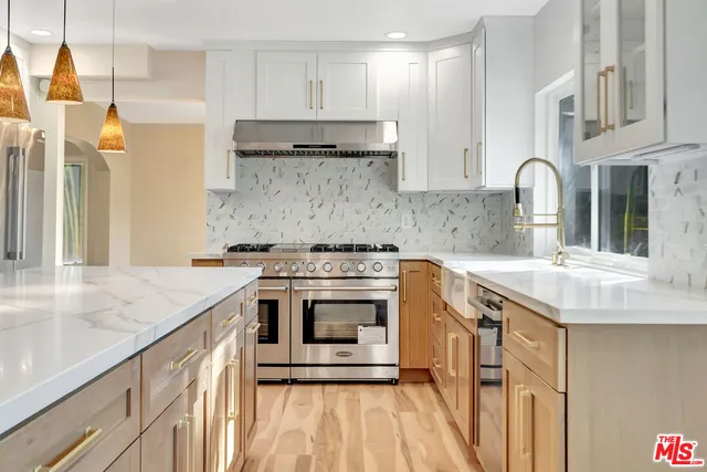 a living room with fireplace furniture and a flat screen tv