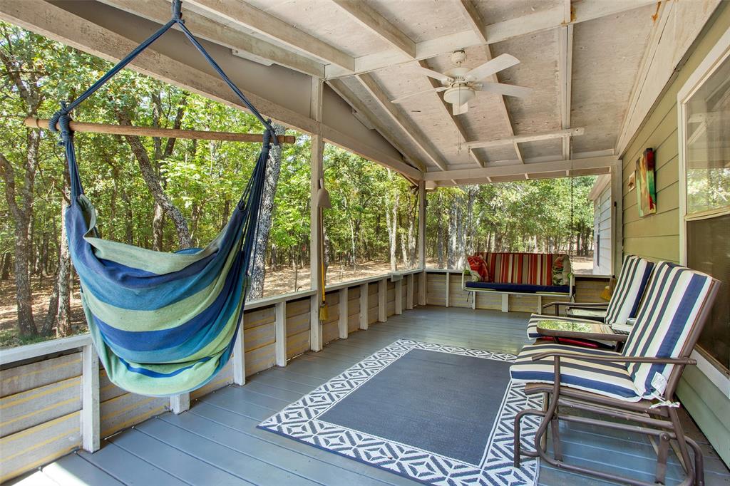 1793 Greer Road Sadler, TX 76264 - Photo 14 of 35 a backyard of a house with wooden floor outdoor seating and furniture