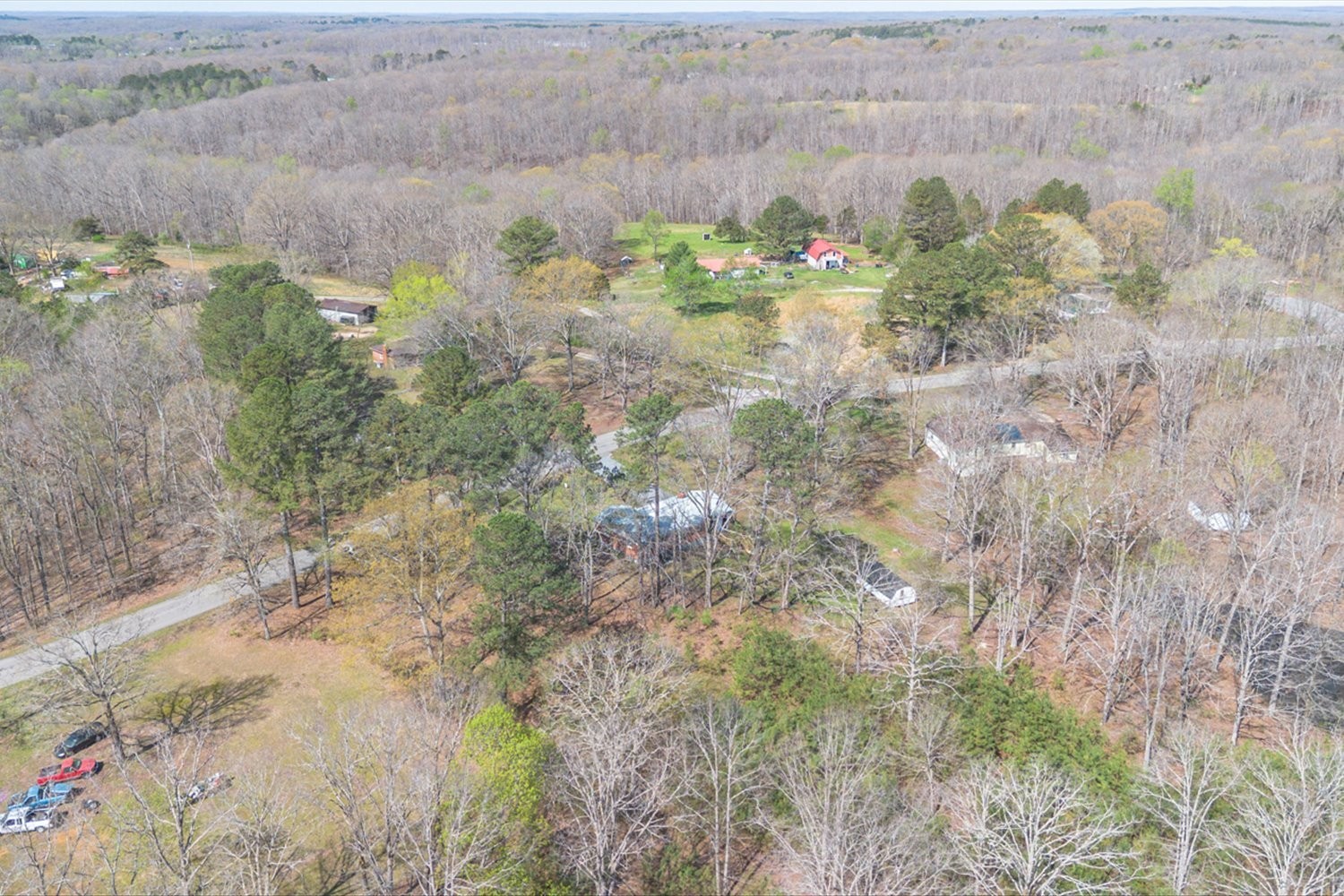 2540 Grays Bend Road Centerville, TN 37033 - Photo 11 of 48 a view of a lake with a yard and trees