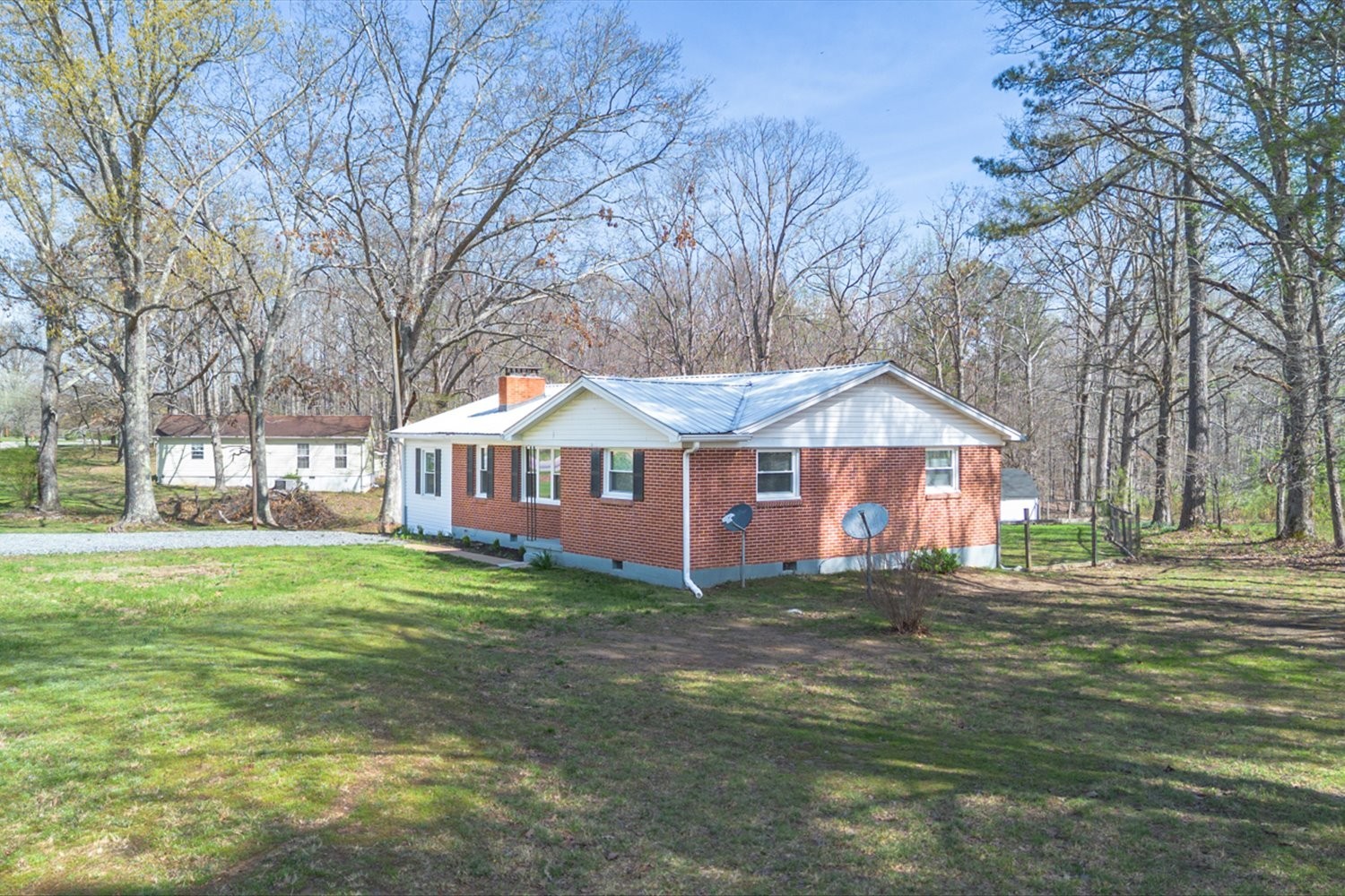 2540 Grays Bend Road Centerville, TN 37033 - Photo 2 of 48 a front view of a house with a yard