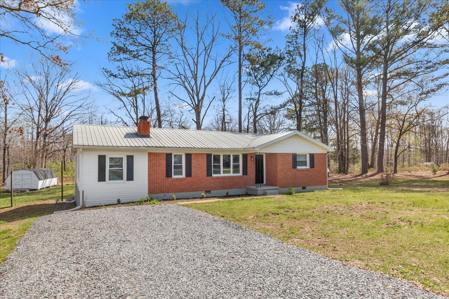 2540 Grays Bend Road Centerville, TN 37033 - Photo 21 of 48 a front view of a house with a garden