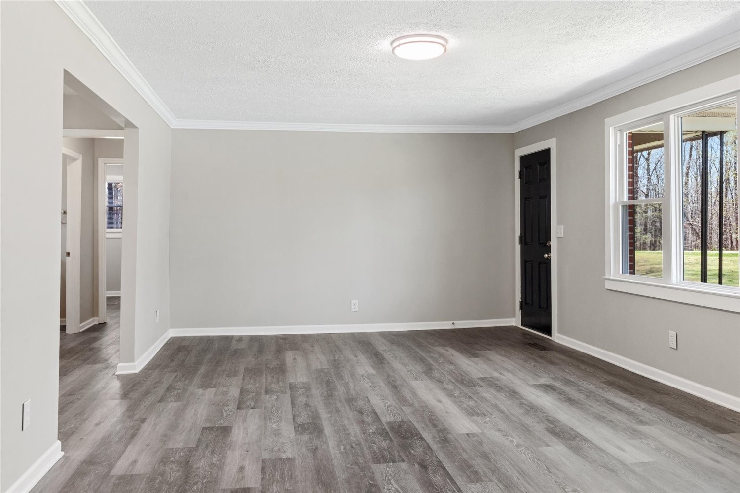 2540 Grays Bend Road Centerville, TN 37033 - Photo 25 of 48 wooden floor in an empty room with a window
