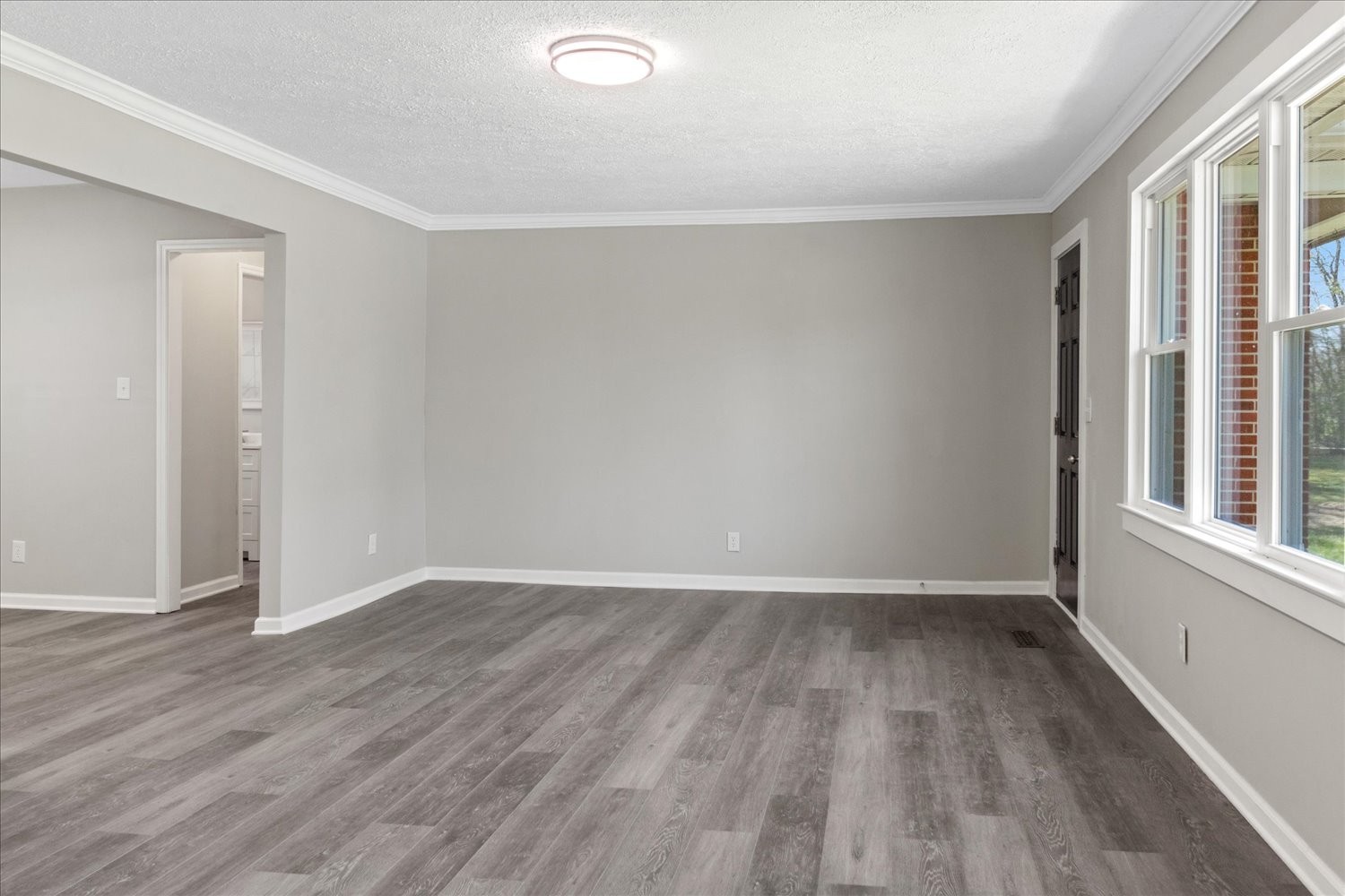 2540 Grays Bend Road Centerville, TN 37033 - Photo 26 of 48 a view of an empty room with wooden floor and a window