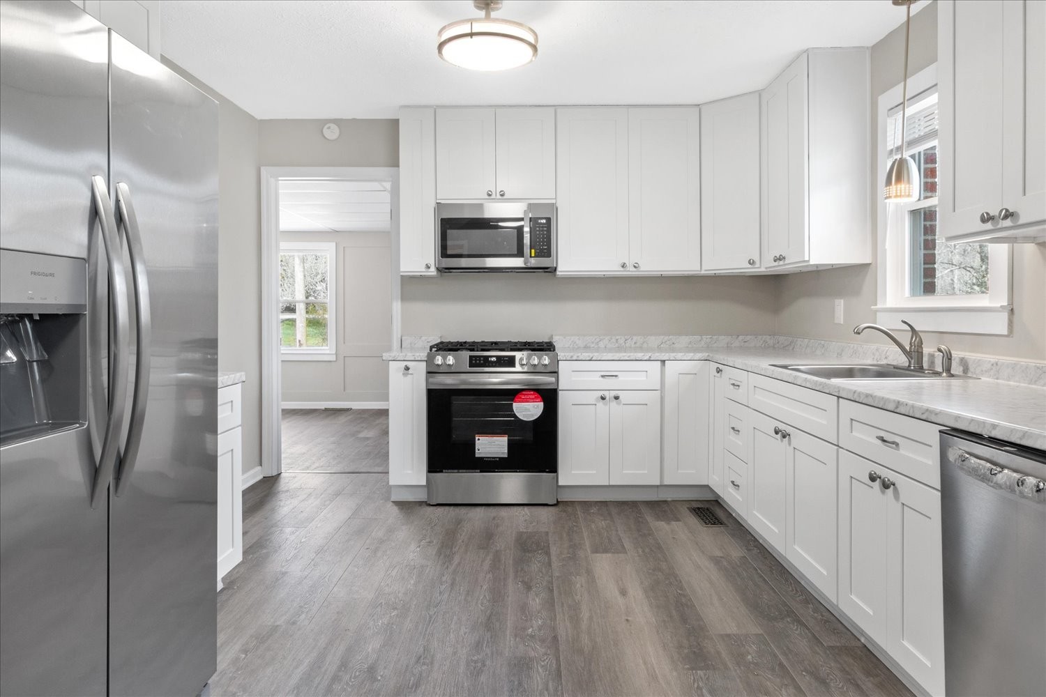 2540 Grays Bend Road Centerville, TN 37033 - Photo 28 of 48 a kitchen with stainless steel appliances granite countertop a refrigerator sink and stove