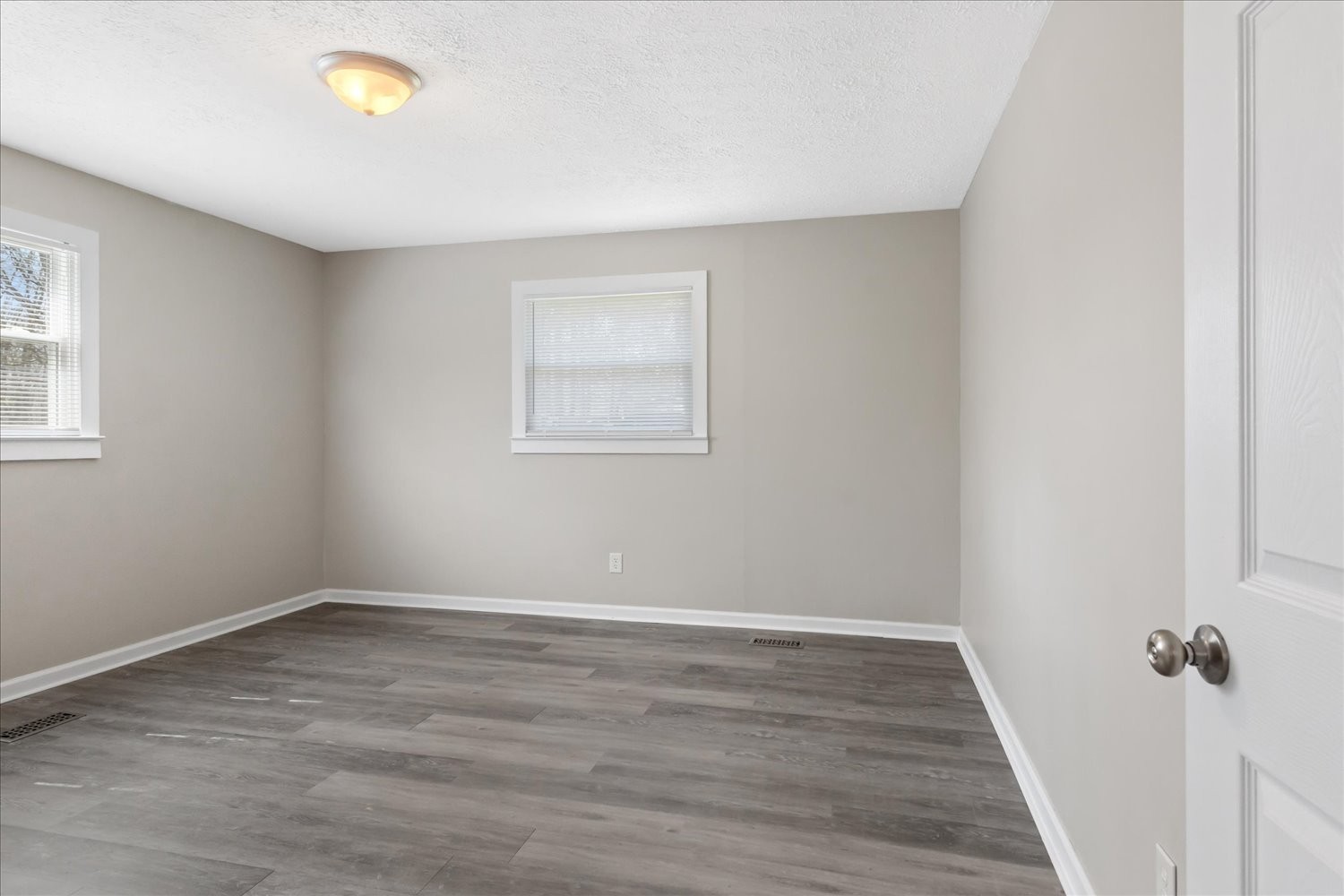 2540 Grays Bend Road Centerville, TN 37033 - Photo 36 of 48 wooden floor in an empty room with a window