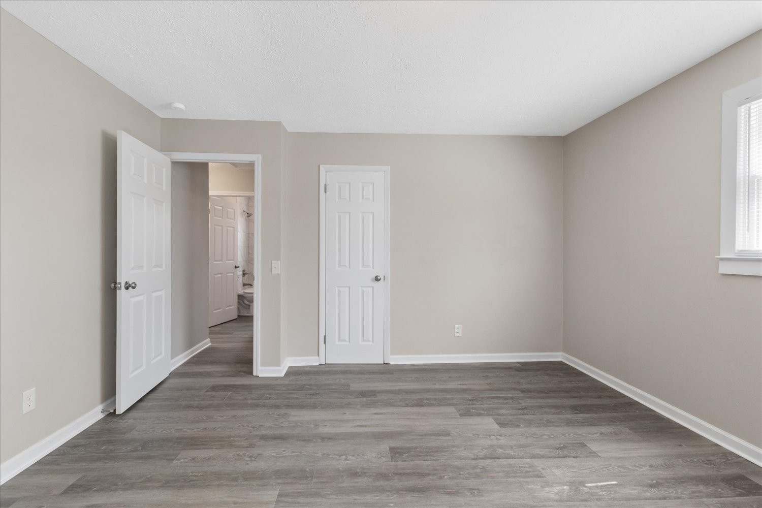 2540 Grays Bend Road Centerville, TN 37033 - Photo 37 of 48 a view of an empty room with wooden floor