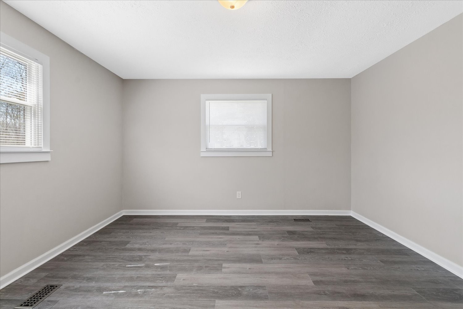 2540 Grays Bend Road Centerville, TN 37033 - Photo 38 of 48 wooden floor in an empty room with a window