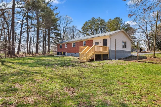 a backyard of a house with lots of green space