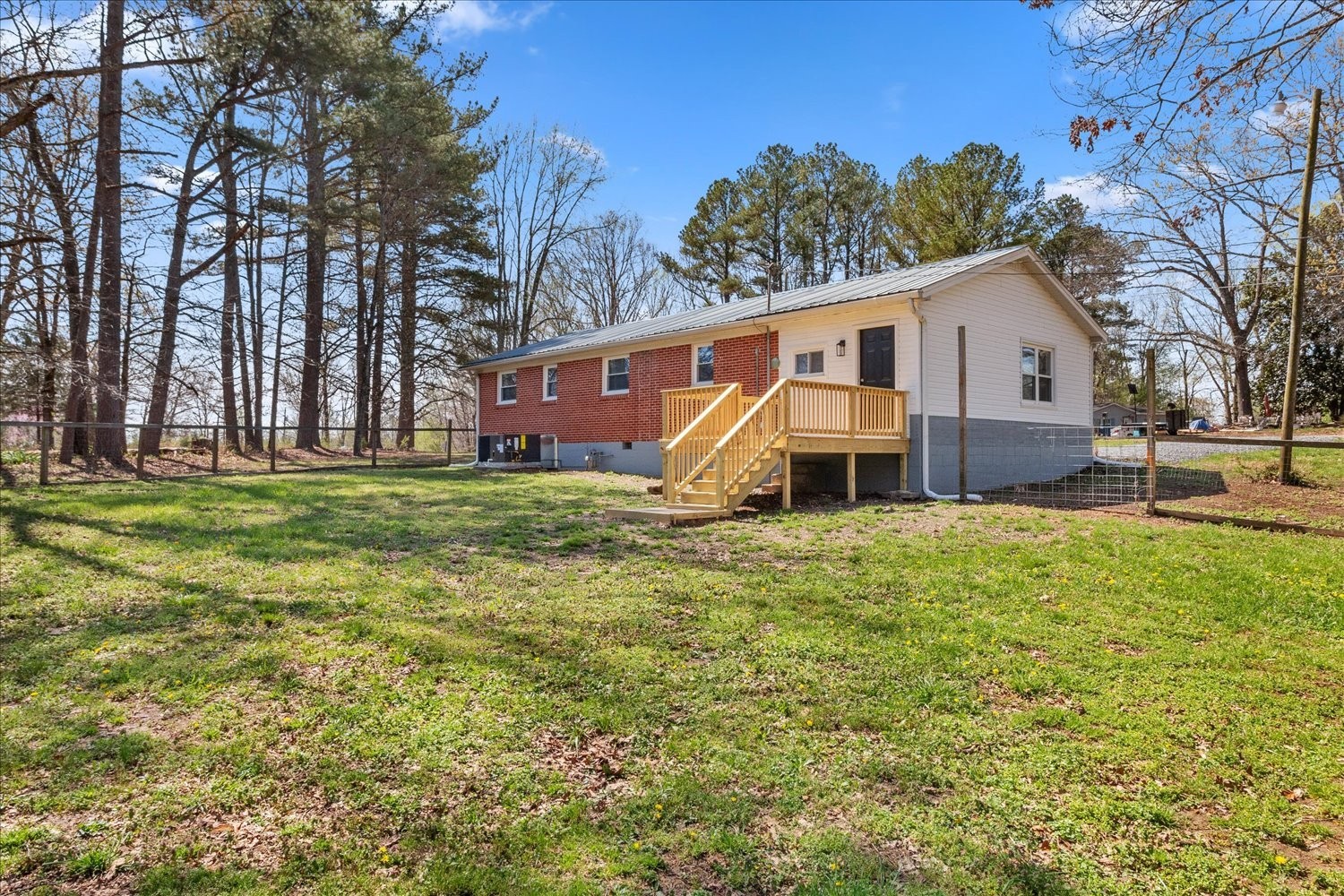 2540 Grays Bend Road Centerville, TN 37033 - Photo 45 of 48 a front view of a house with a yard and trees