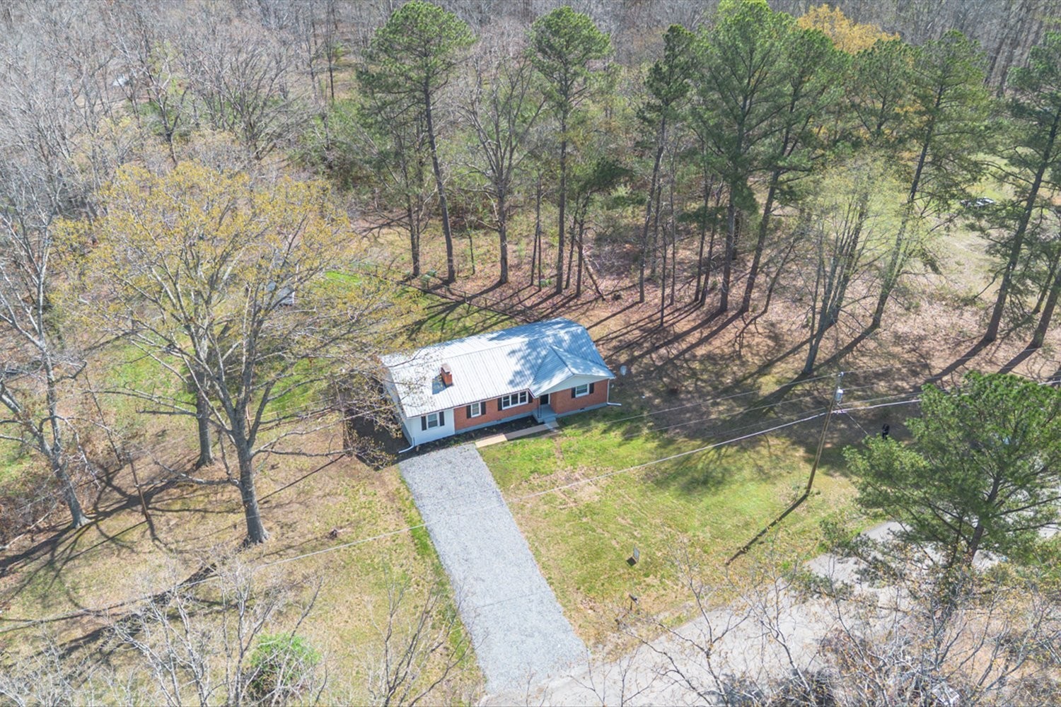 2540 Grays Bend Road Centerville, TN 37033 - Photo 5 of 48 a view of a swimming pool with a yard