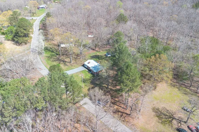 a view of a yard with trees