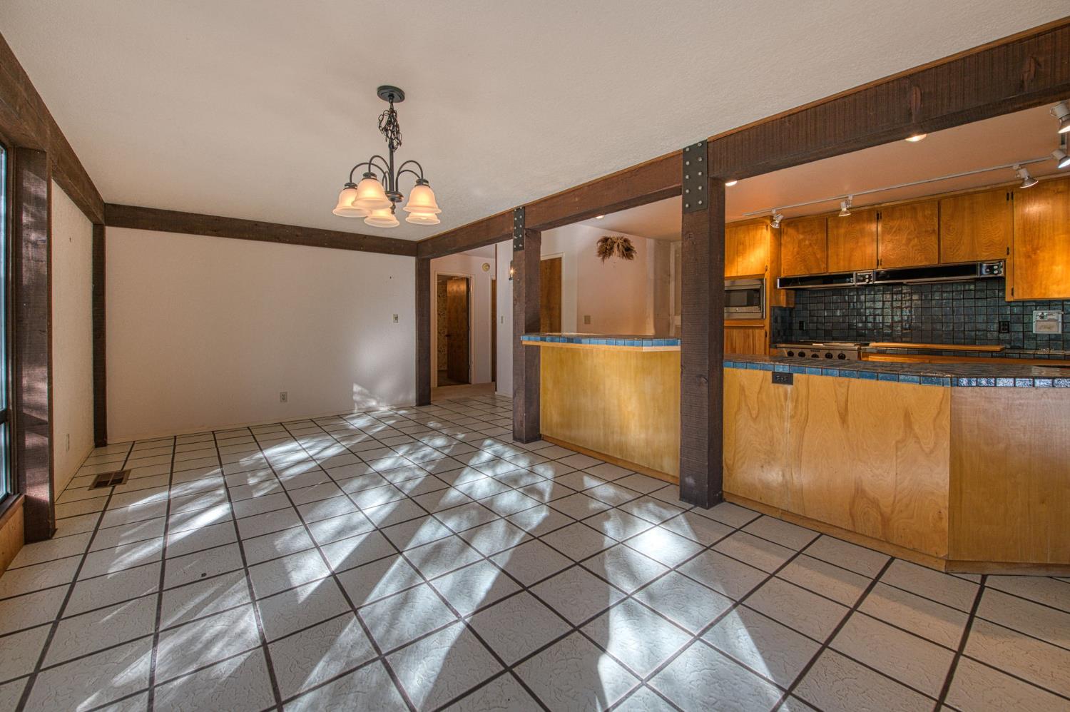 39326 Littlefield Road Shaver Lake, CA 93664 - Photo 18 of 49 a view of a livingroom with a chandelier