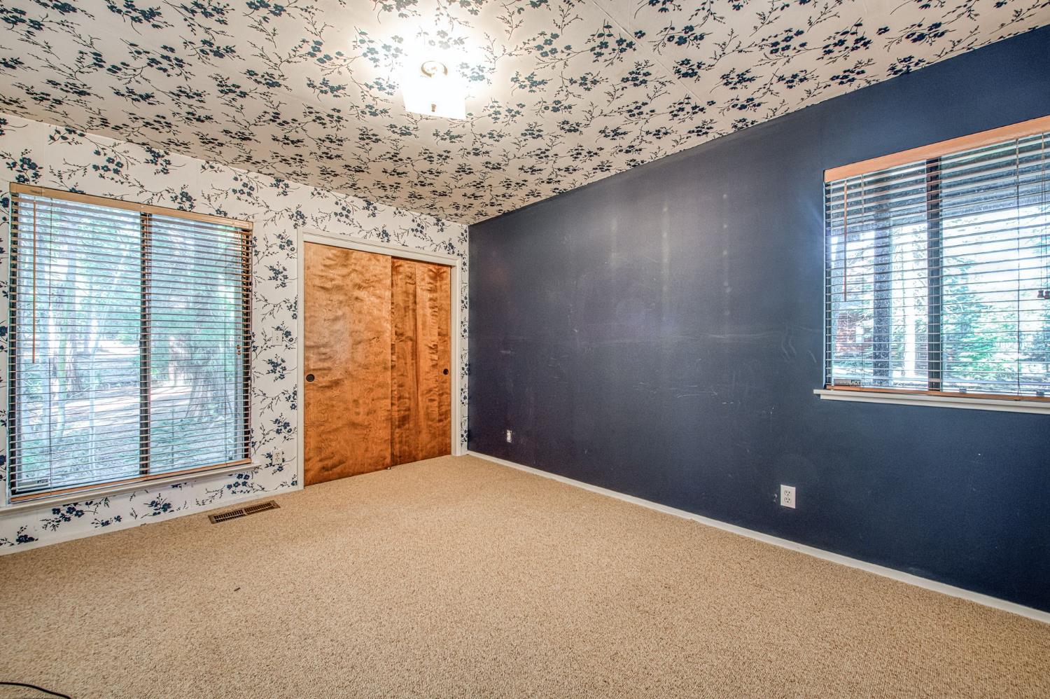 39326 Littlefield Road Shaver Lake, CA 93664 - Photo 23 of 49 a view of an empty room with a window