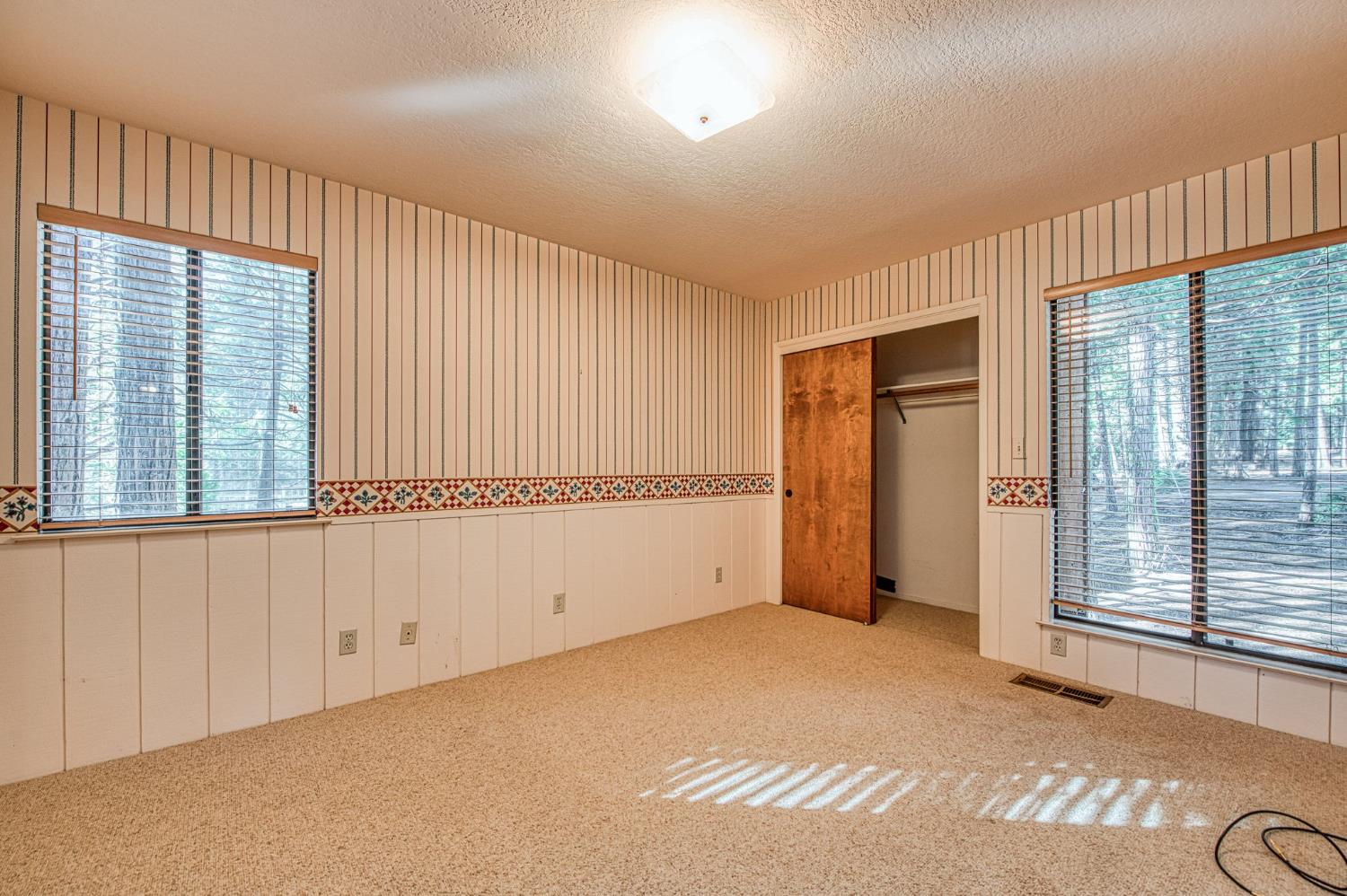 39326 Littlefield Road Shaver Lake, CA 93664 - Photo 24 of 49 a view of an empty room with a window