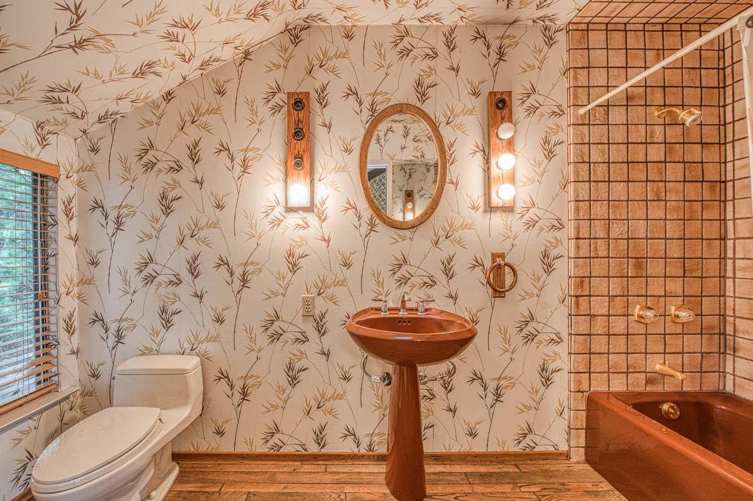 39326 Littlefield Road Shaver Lake, CA 93664 - Photo 32 of 49 a bathroom with a toilet and a sink